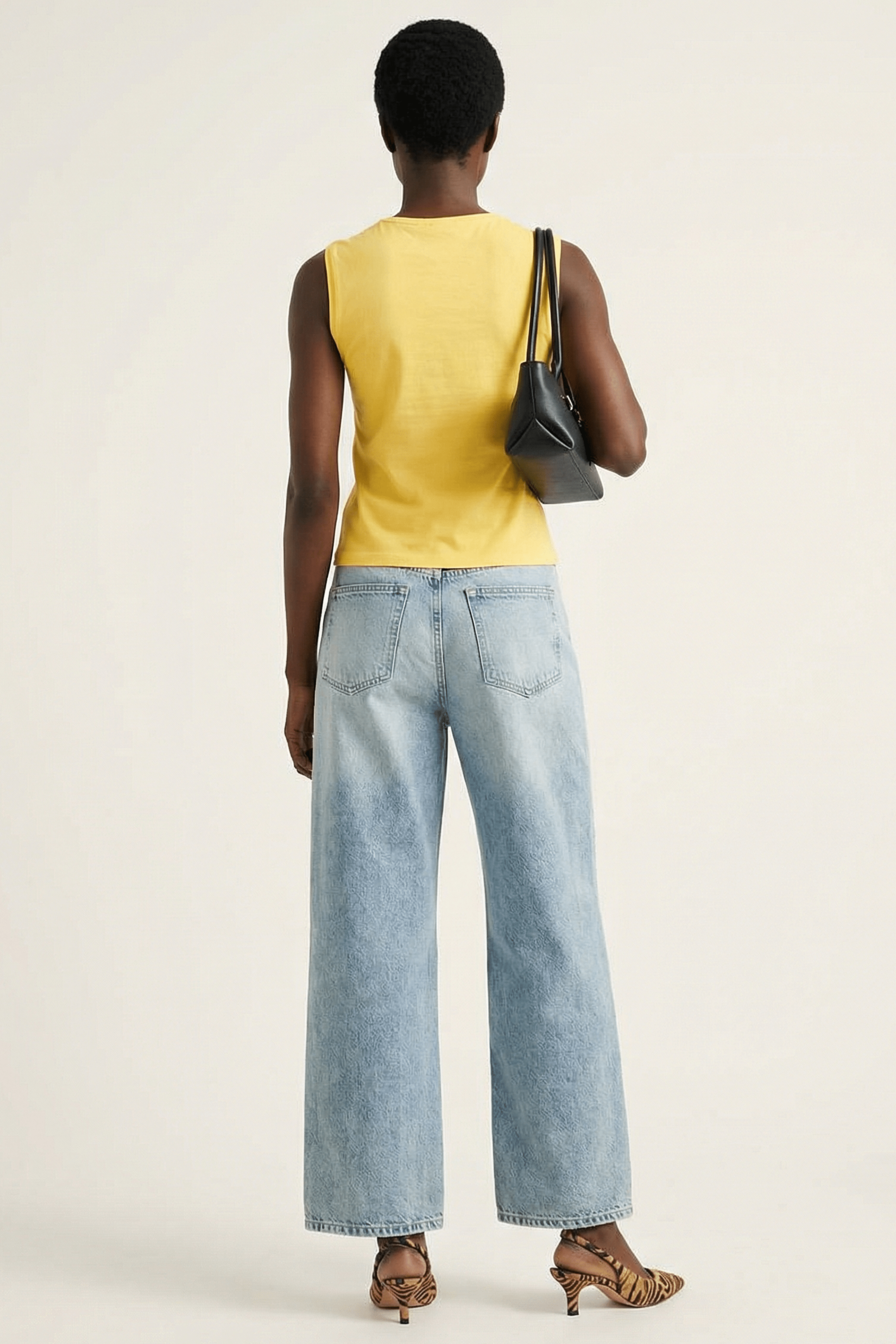 Camiseta amarilla recogido y flor en el delantero Lolitas&L - lolitasyl.com