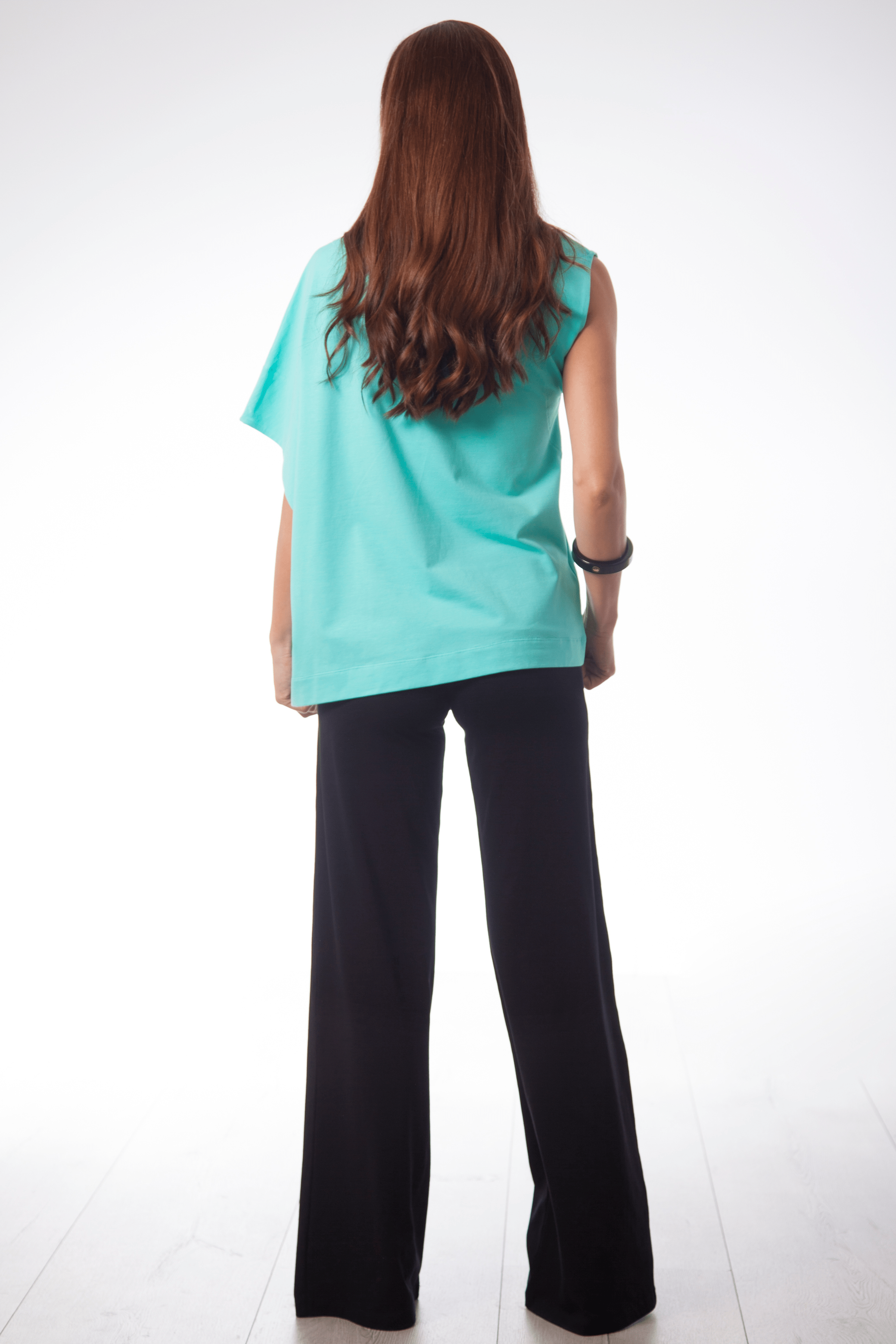 Camiseta celeste asimetrica con flor Lolitas&L - lolitasyl.com