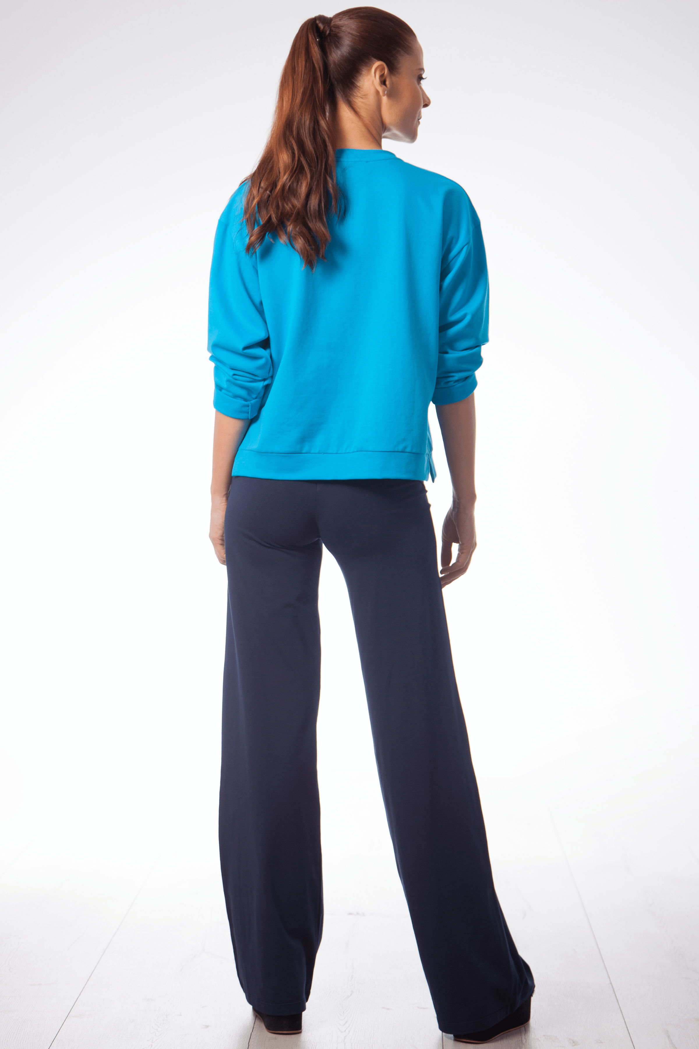 Sudadera azul turquesa con flor en el hombro Lolitas&L - lolitasyl.com