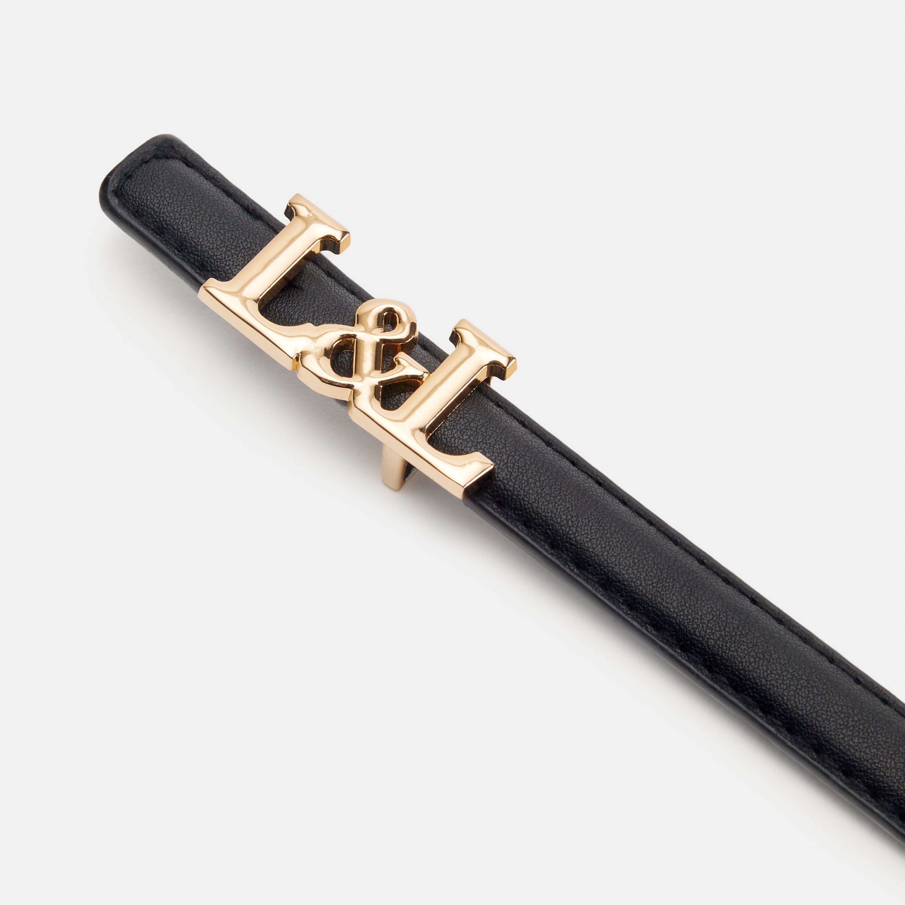 Cinturón negro polipiel estrecho logo L&L - lolitasyl.com