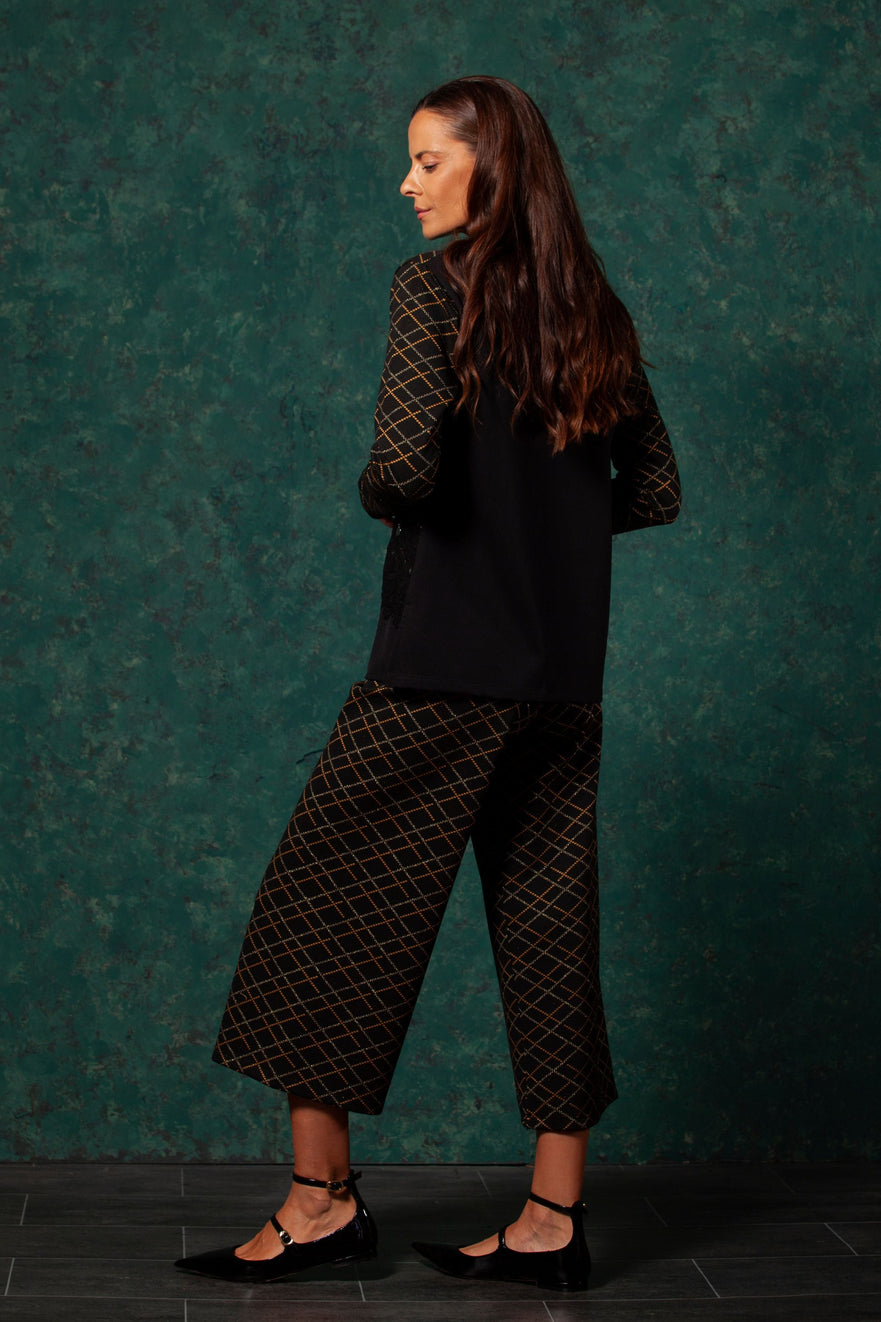 Camiseta negra con estampado sun geometrico LolitasyL - lolitasyl.com